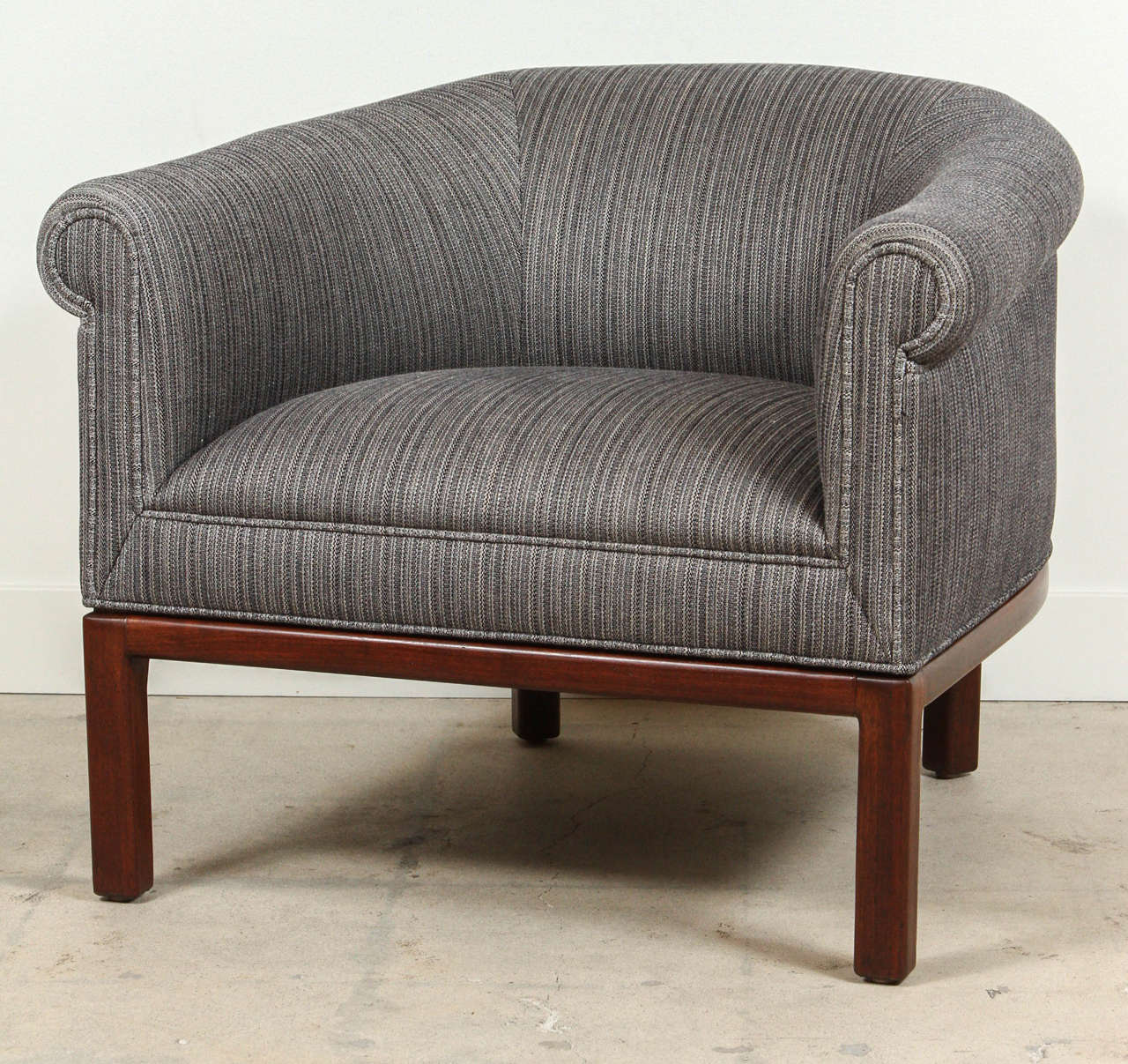 Pair of barrel back chairs by Jules Heumann for Metropolitan Furniture.
New cotton/silk contract trade upholstery.
Solid walnut bases.