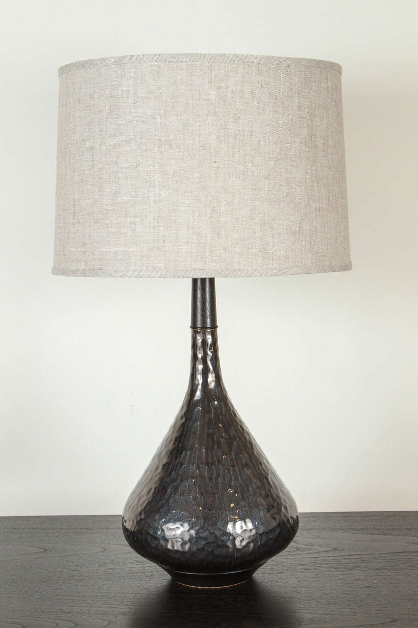 Carved Miller Lamp in anthracite by Stone and Sawyer with ebonized walnut and blackened brass details.