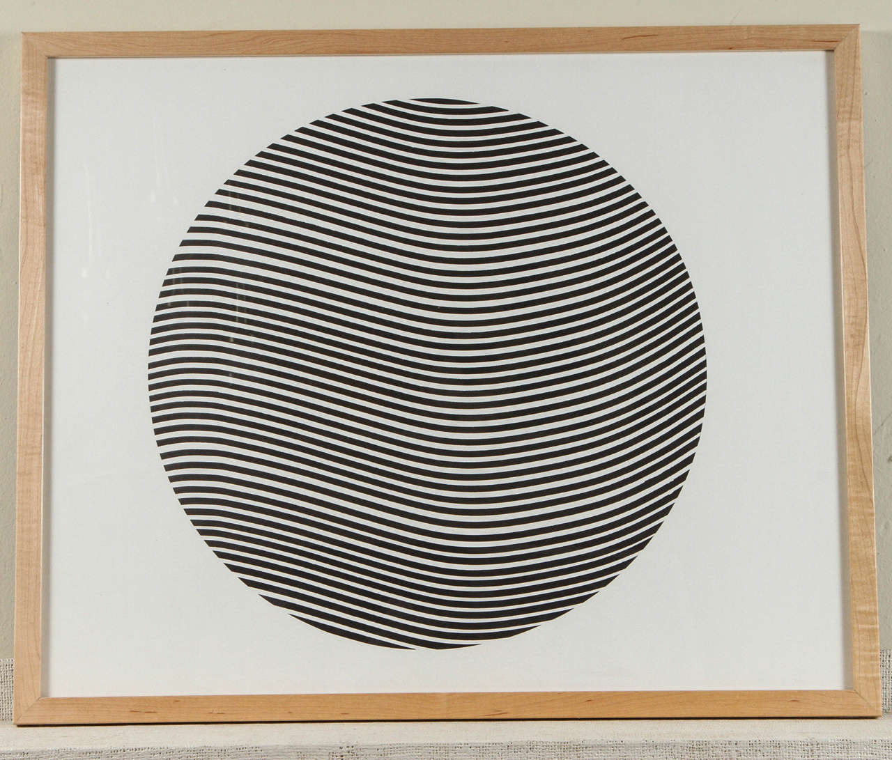Black and white op art print from the 1970s. Not signed by attributed to Marc Schreibman. Maple frame.