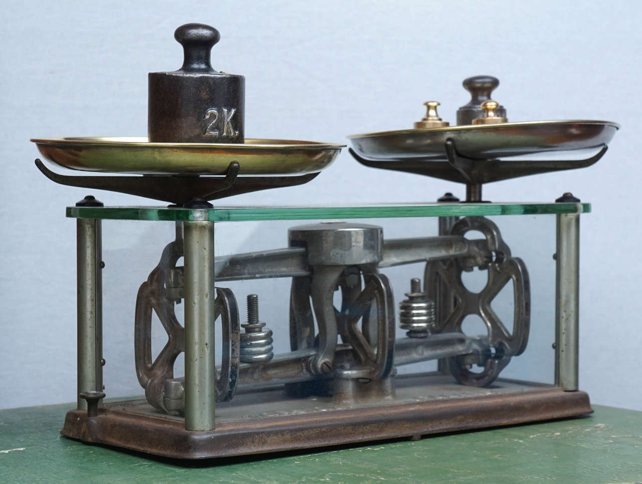 We are loaded with antique scales at Painted Porch and here is our most unique scale. It is in glass and American with a metal label from 1882. This was used as a pharmacy scale. We have at least 12 scales at Painted Porch and they work and almost
