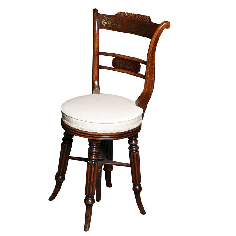 A 19th. century Faux Rosewood Piano Chair