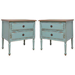 A pair of bedside commodes