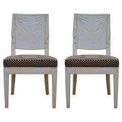 A pair of art deco style side chairs