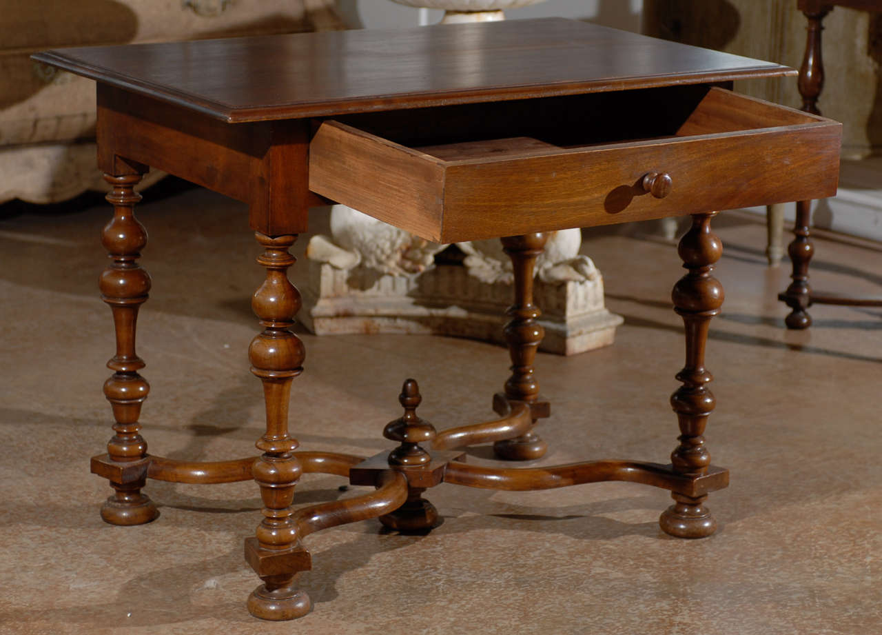 Pair of Louis XIII Style Walnut Tables with Turned Legs- Early 19th Century- Circa 1810. Please Note These Tables are Antiques and are Two of a Kind. Please Refer to Our Website for Our Complete Inventory.