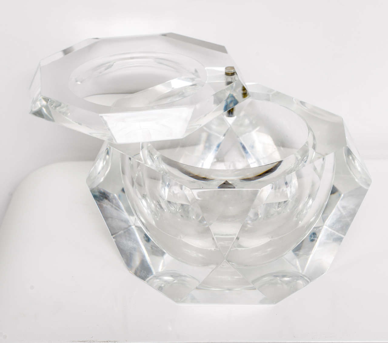 Large vintage faceted ice bucket with swivel lid.