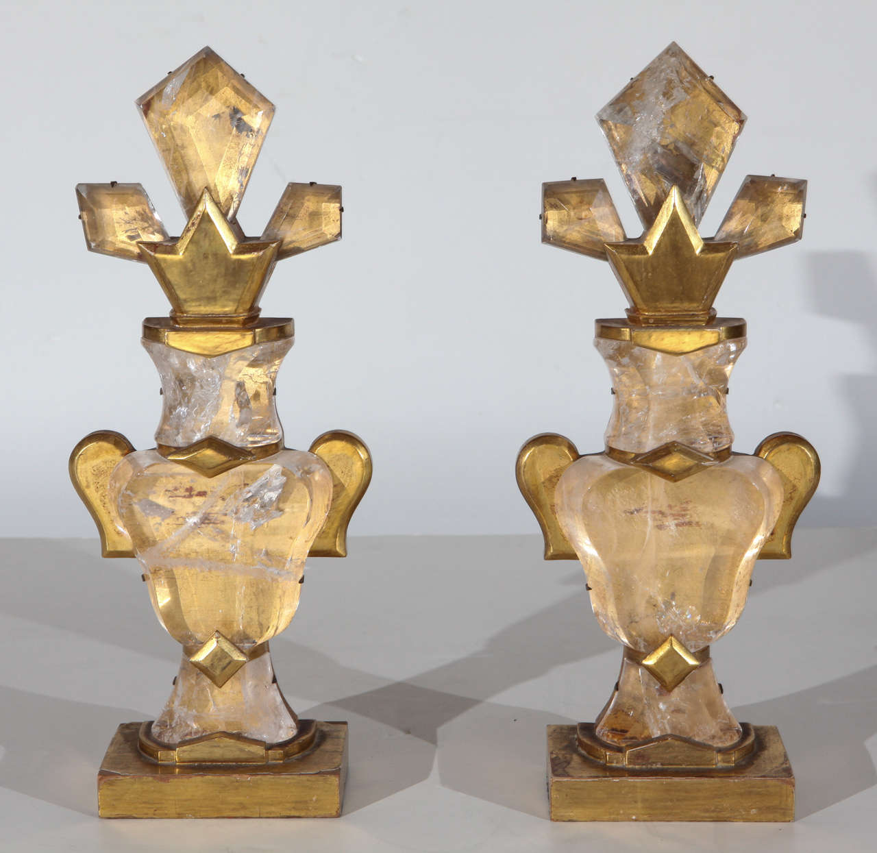 Pair of French, baguette style, rock crystal, urn form, gilt wood garnitures.