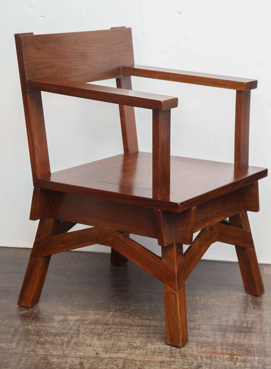 Early designed chair of Italian walnut. Architectural construction, inlaid triangle of ebony on seat back. Branded signiture on rear.
Originally designed in 1919, this particular model is from a small re-edition, circa 1990 by Delecta.