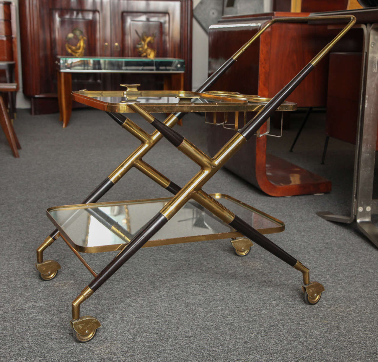 BEAUTIFUL BAR / SERVING CART MADE IN MILAN 1955,DESIGNED By CESARE LACCA. HAS A REMOVABLE SERVING TRAY WITH BOTTLE RACK NICE BRACE FITTINGS.