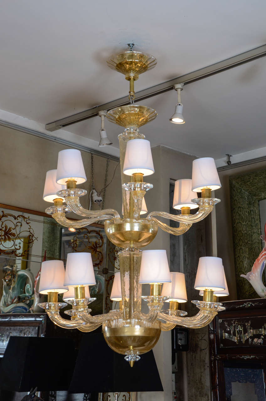 Pair of chandeliers in Murano glass with 14 arms, restored.