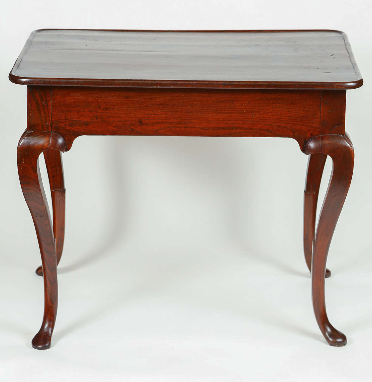 18th Century chestnut Portuguese Side Table features a single drawer, cabriolet style legs with pad feet, and a moulded top. Executed circa 1760s in Portugal. 
Dimensions: 33 1/4