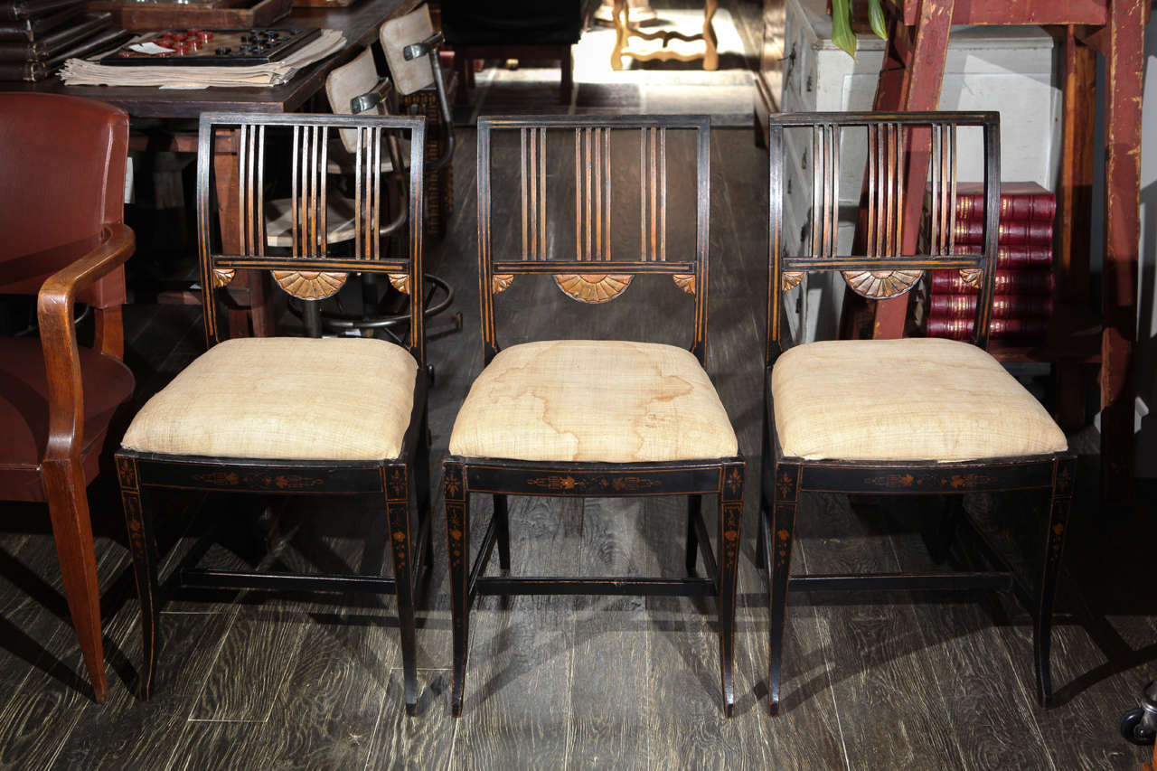 19th century set of six Swedish upholstered and decorated chairs. Great as dining chairs or accent chairs.
