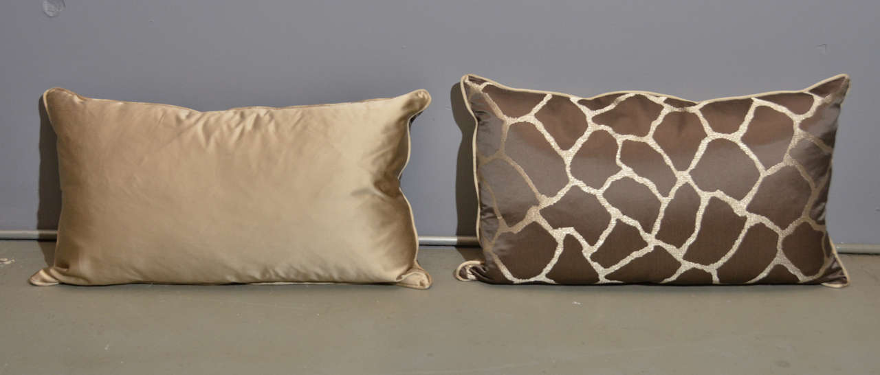 Pair of scalamandre giraffe pillows. Extra high quality down blend insert. Gorgeous super luxurious fabric. Available individually for $300.
