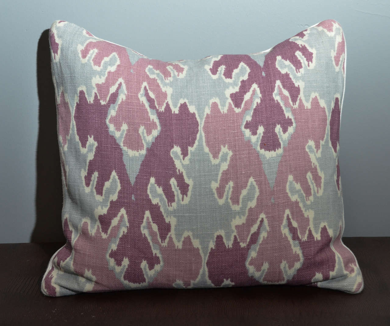 Soothing purple and gray toned Ikat patterned pillows. Top quality down insert with quality zip closure.