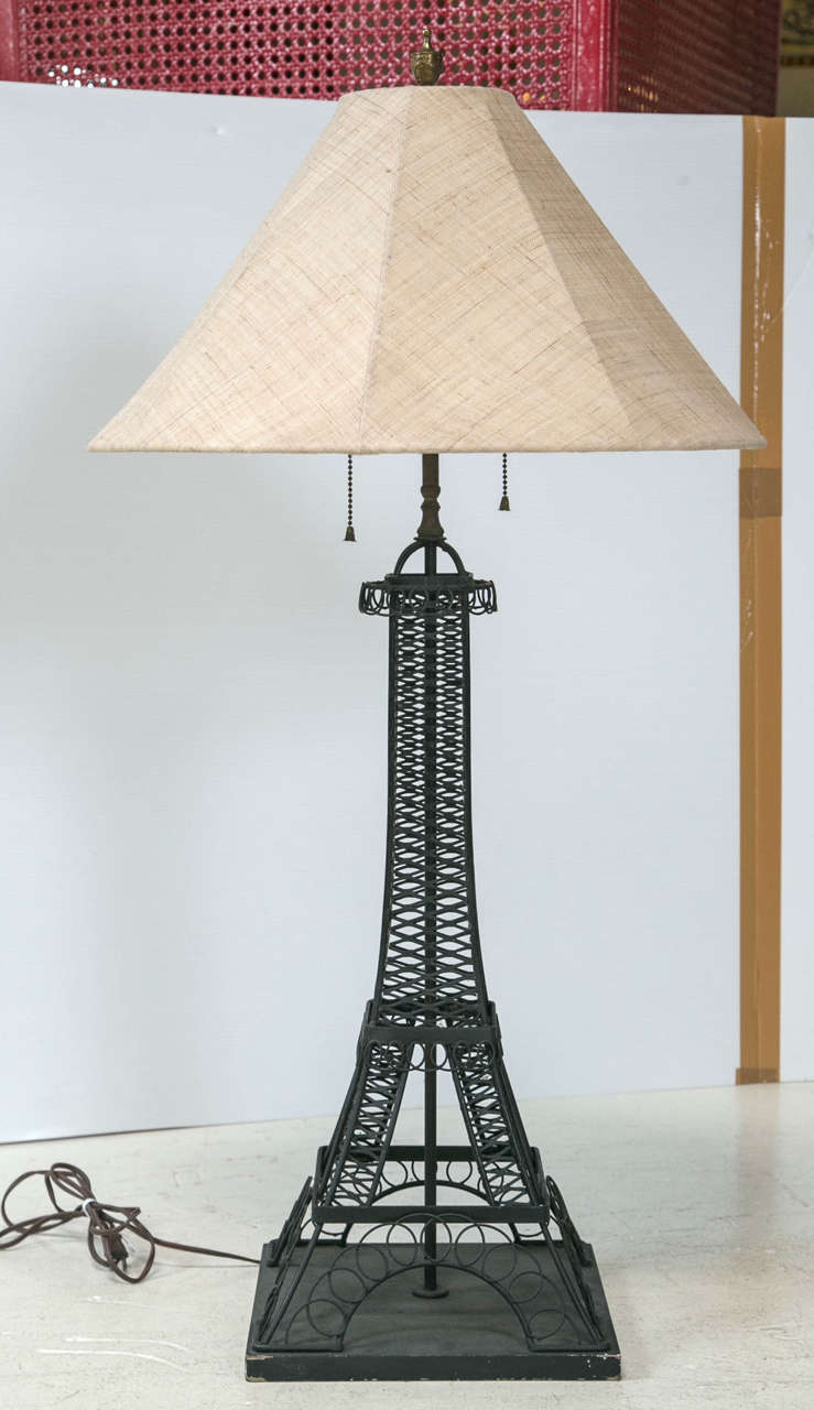A pair of midcentury lamps in the shape of the Eiffel tower.