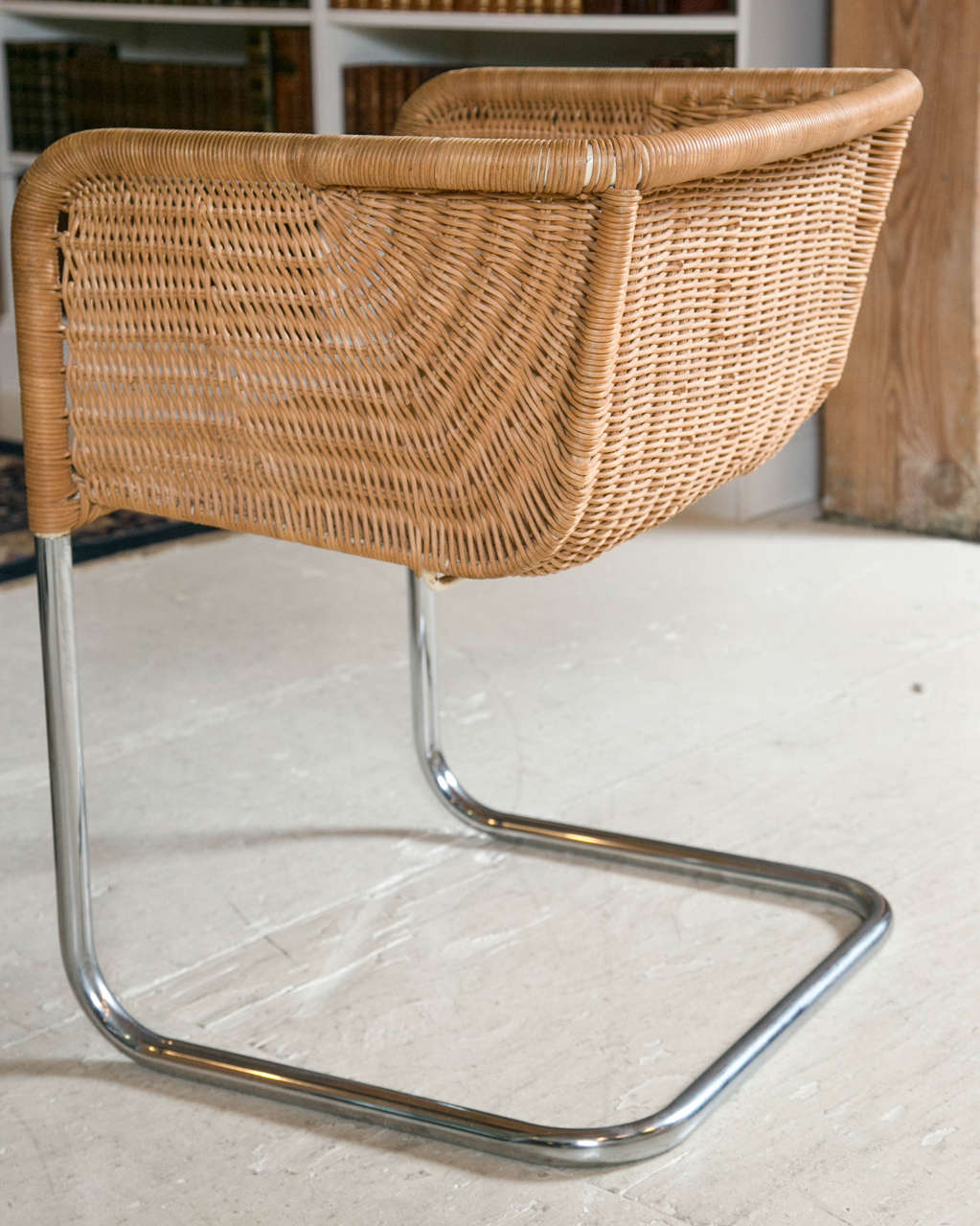 Set of Four Cantilevered Chrome and Wicker Chairs In Excellent Condition In Stamford, CT