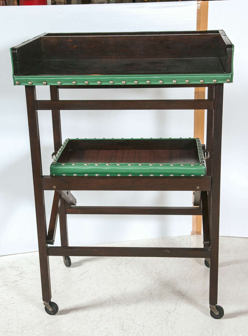 Two-tier butlers tray in green vinyl, wood mirror- removable trays.