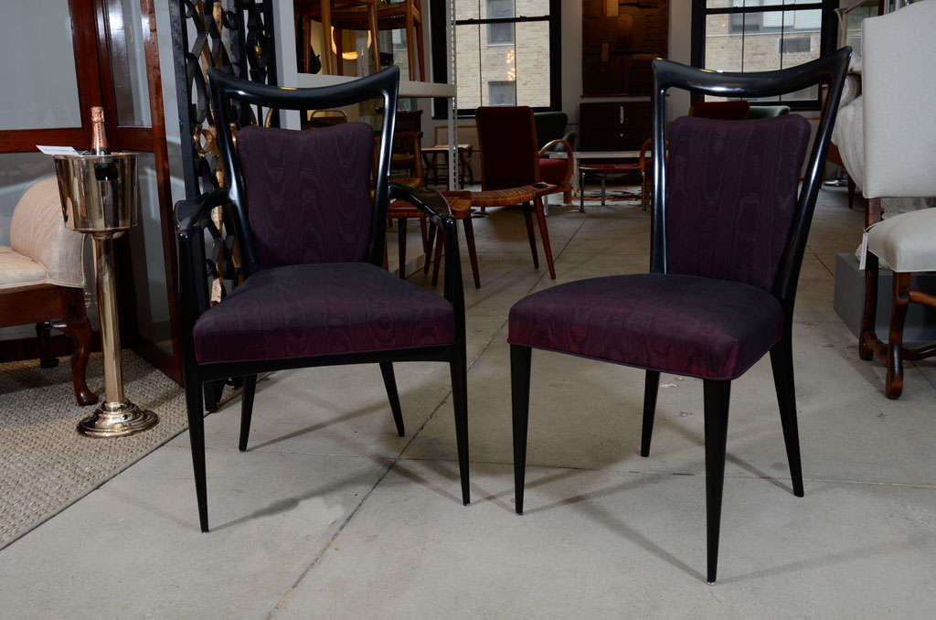 A set of sleek, black lacquered dining chairs (2 arm and 4 side) designed by Italian designers Mario Gottardi and Melchiorre Bega for the Bristol Hotel in Murano.