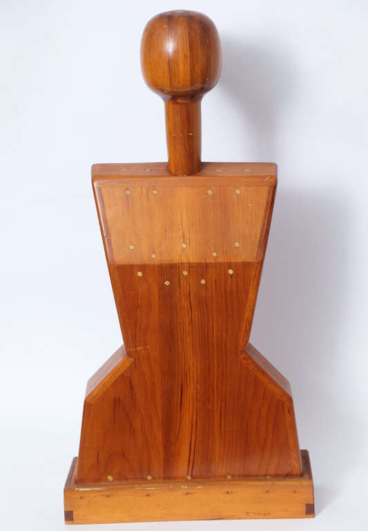 A female torso wood sculpture signed Mike Nevelson, 1961.
Louise Nevelson's Son