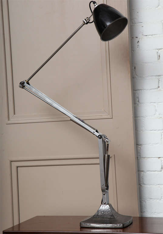 Tall English Industrial anglepoise task lamp with original Sheffield nickel type patina and black enamel shade, circa 1940.