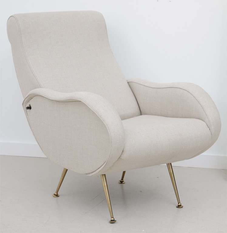 Pair of reclining Italian vintage armchairs by Marco Zanuso- in beige linen fabric with brass conical legs.