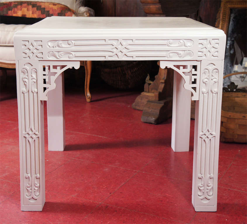 Intricately carved Chinese chippendale style painted side table.