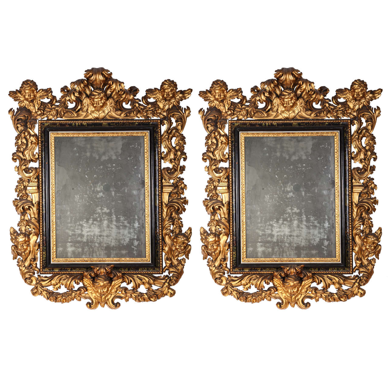 Stunning Pair of Carved Italian Giltwood Mirrors 17' century