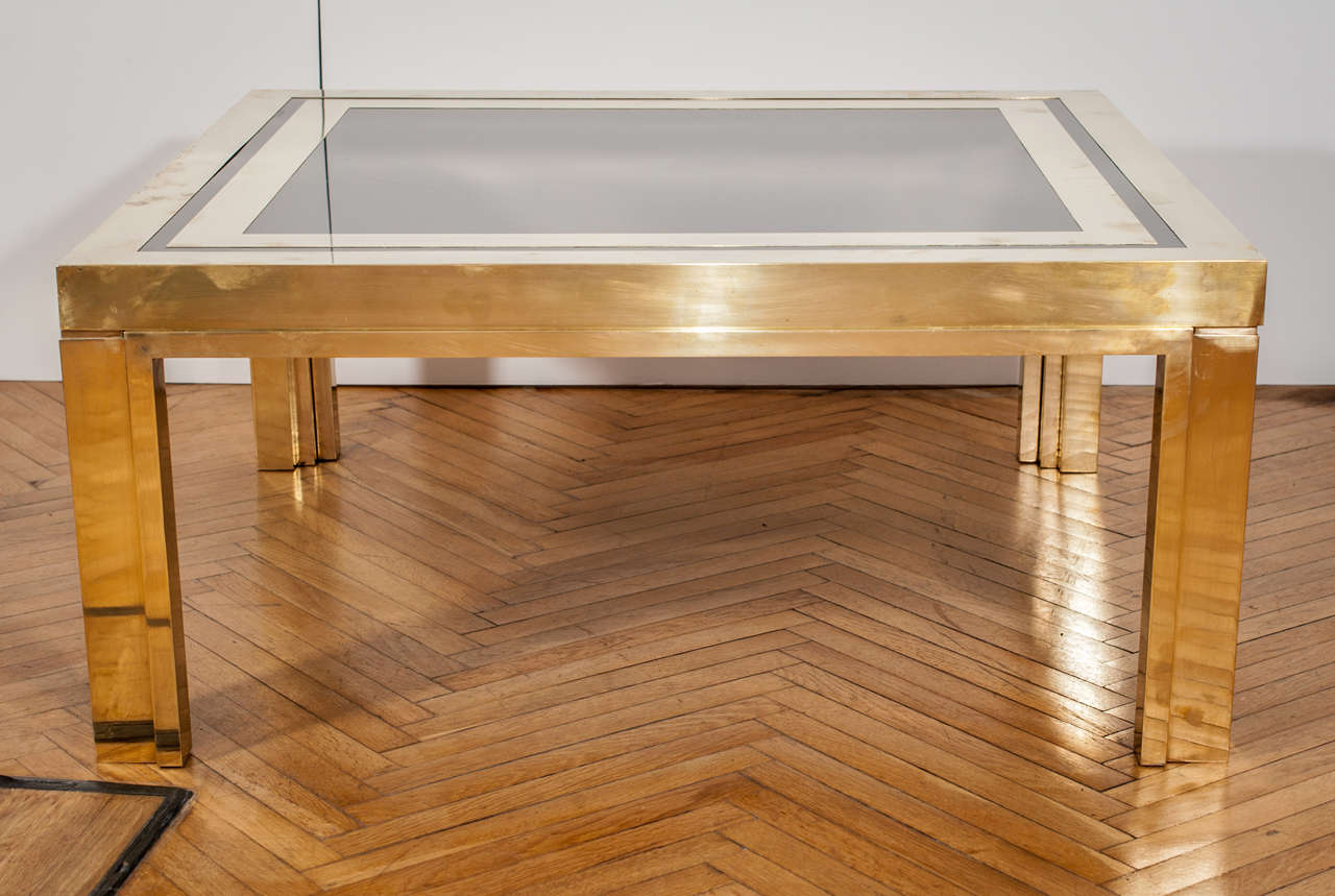 Brass and glass coffee table.
Italian manufacture, 1970's.