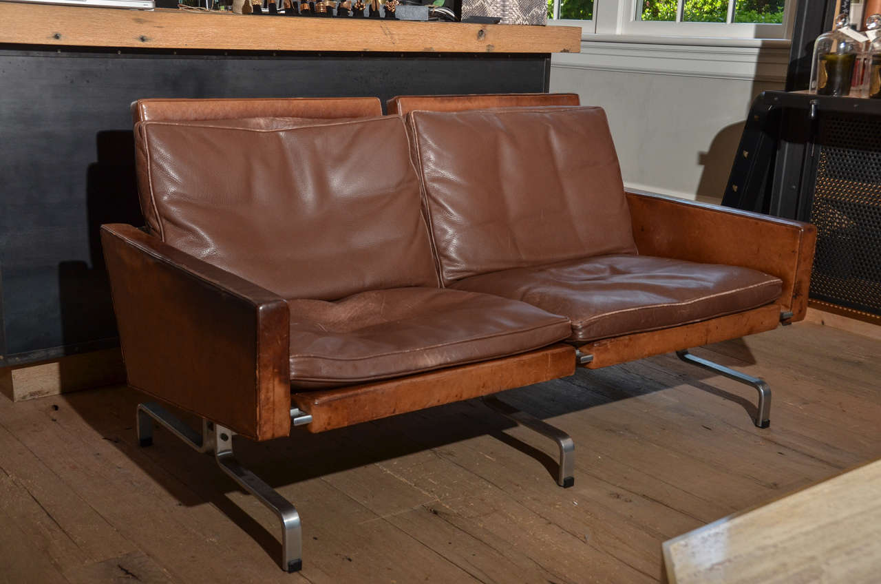 Stunning Poul Kjaerholm PK 31 leather and steel two seat sofa designed 1958.
