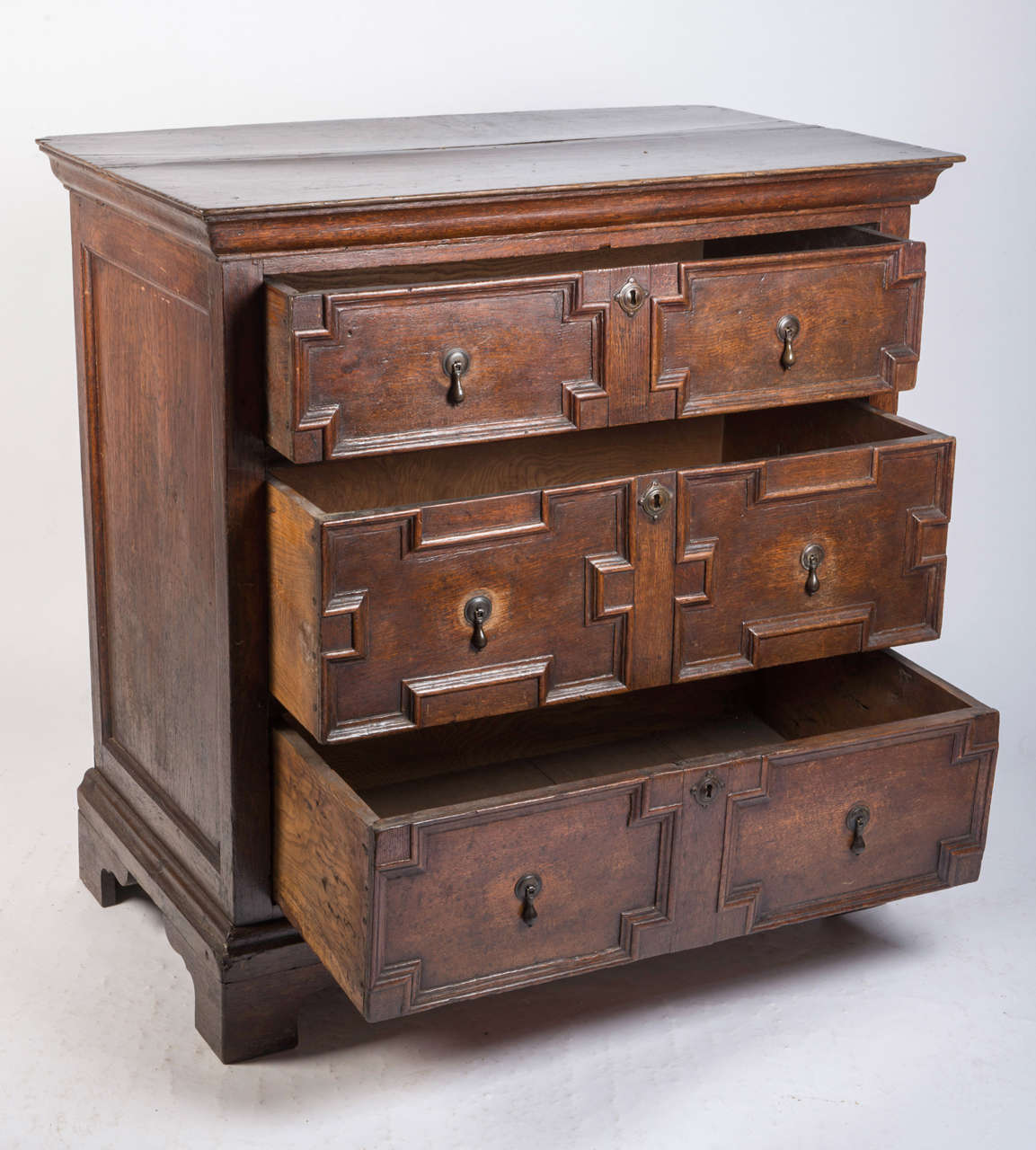 Oak chest of moulded drawers