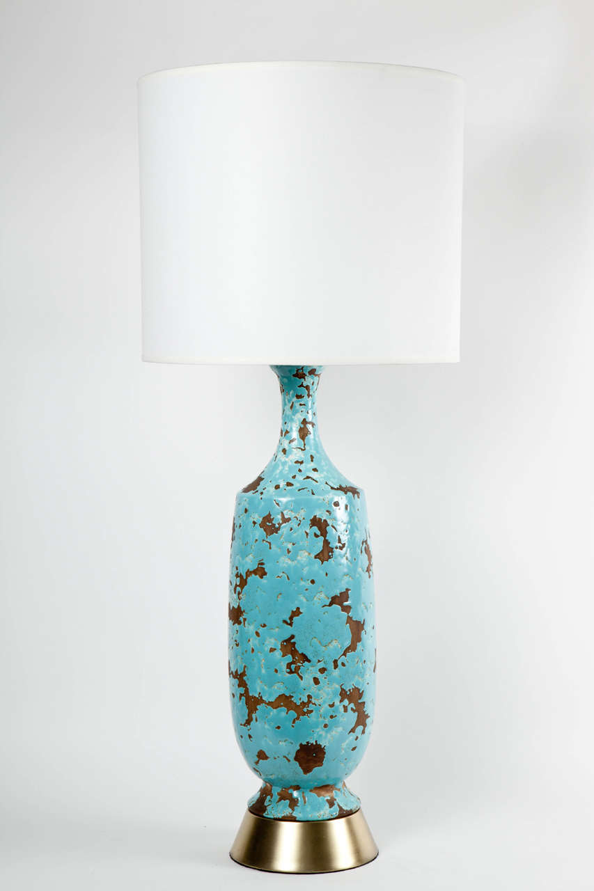 Fantastic pair of midcentury classic Italian Turquoise glazed ceramic lamps on satin brass bases. New wiring and sockets.