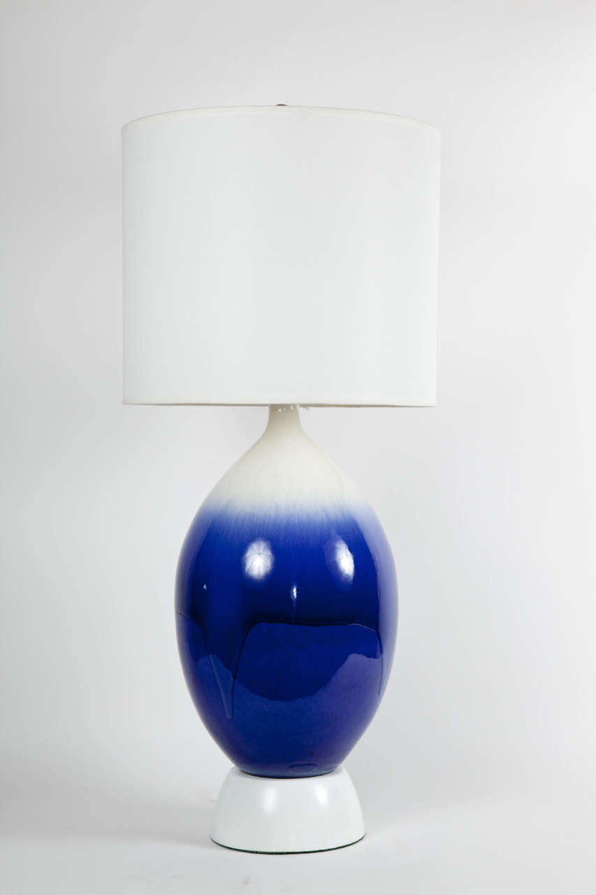 Fantastic Sapphire Blue/White Ombre glazed ceramic lamp on a white lacquer base. Rewired for use in the USA.