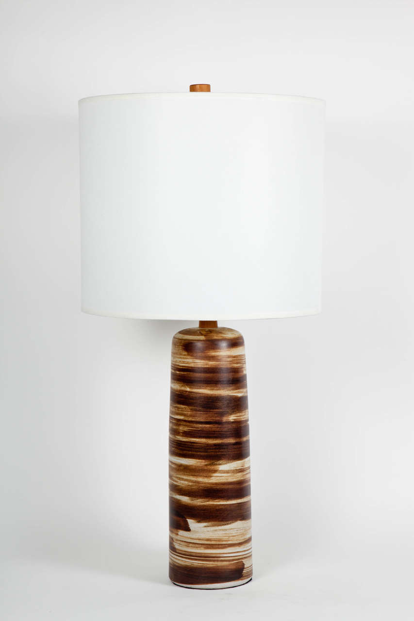 Fantastic Mid Century lamp with brushstroke pattern in Browns and Ivory by Gordon Martz. Lamp features Walnut neck and finial.