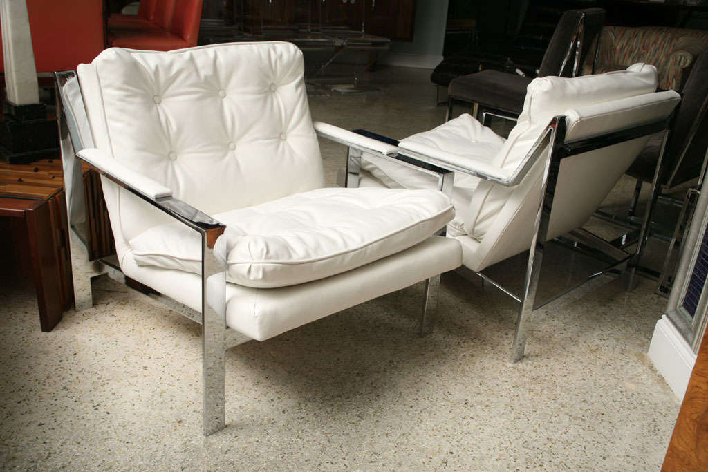 The drop in seat with a cube frame of polished chrome.