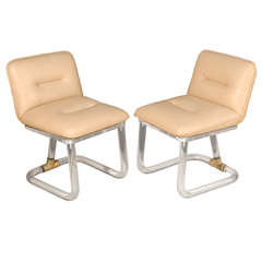 Pair of Lucite Swivel Chairs by Leon Frost.
