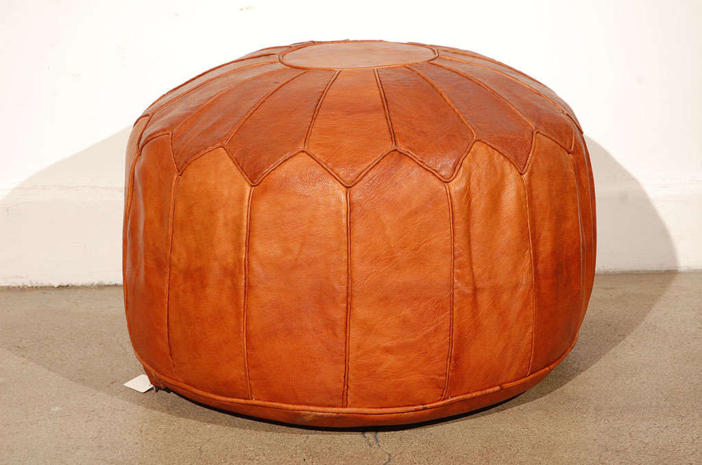 Handcrafted large leather pouf, could be use as on ottoman or footstool, or you can use it as a side table with a tray on it.

We have 4 leather Moroccan pouf that color available, price is for 1 pouf.

Mosaik provides global Antiques, Art Deco,