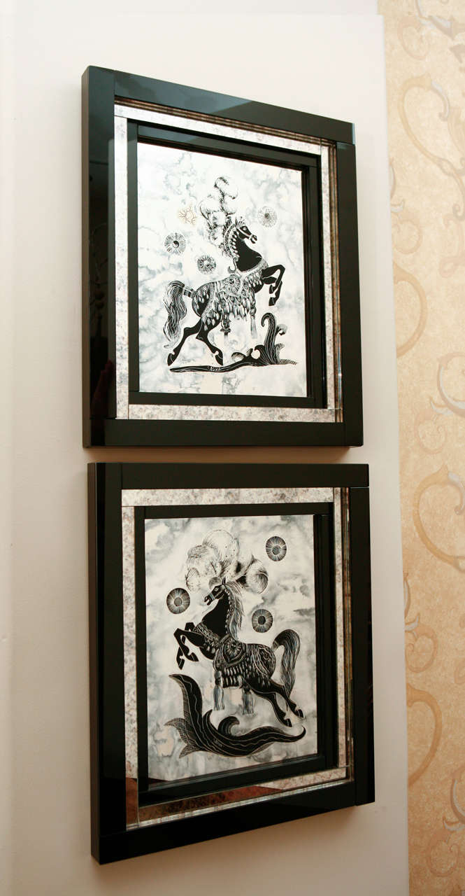 PAIR OF REVERSE PAINTINGS OF HORSES ON MIRROR. NEWLY FRAMED WITH BLACK GLASS AND MIRROR FRAME.  