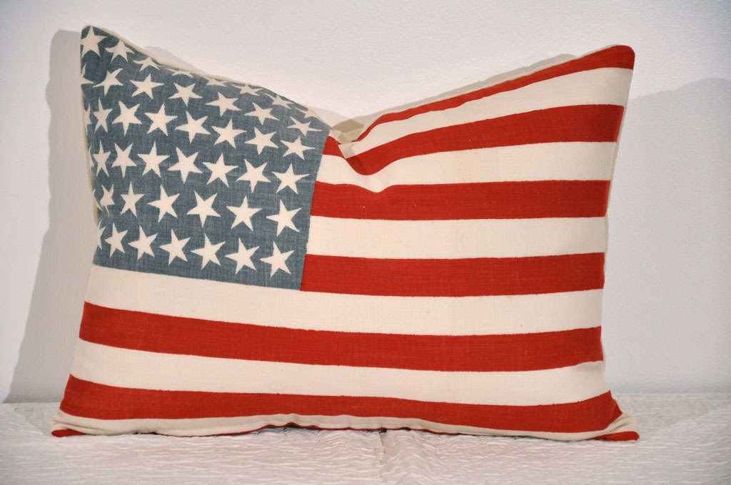 48 STAR FLAG PILLOW W/DOWN AND FEATHER INSERT AND A 19THC LINEN BACKING.
