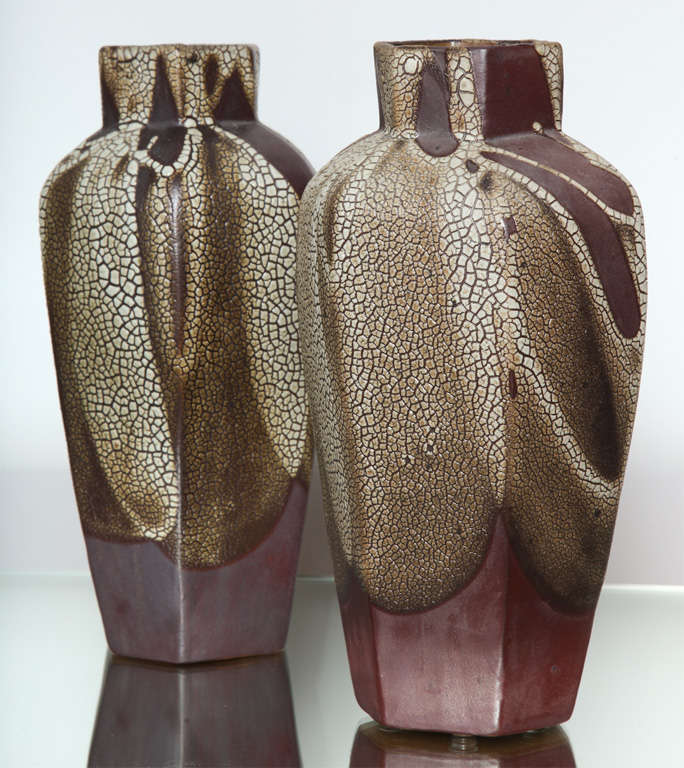 A very interesting pair of Shagreen pattern glaze  Art Deco vases signed by Pointu with the number 23 impressed on the base  They are a very interesting color .brown/grey.  They are created by a well known French ceramicist . C 1930
