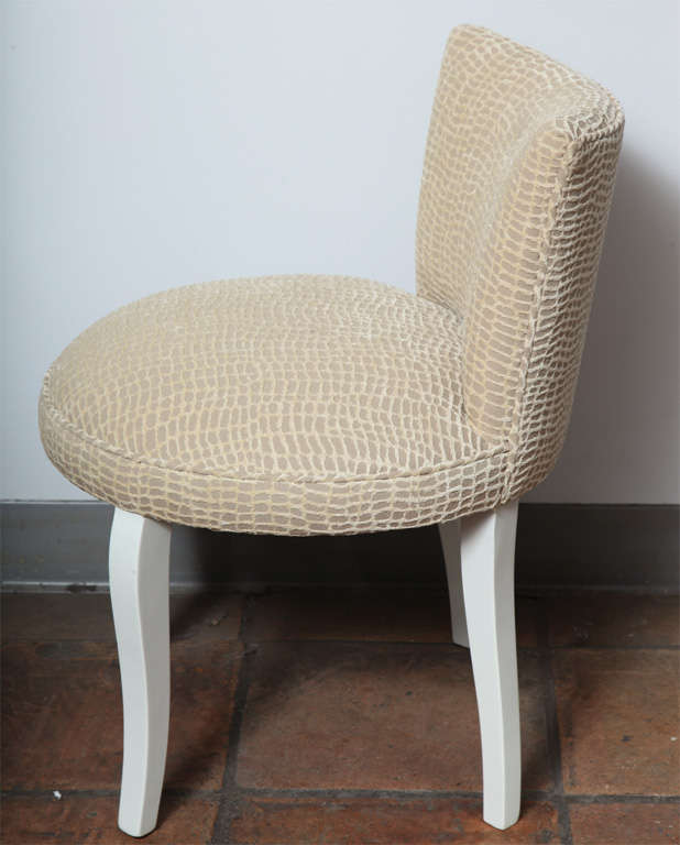 A charming Art Deco upholstered vanity stool
