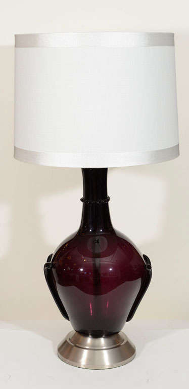 Exceptional pair of deep amethyst Murano glass lamps with applied details at sides and neck, sitting on satin nickel bases.