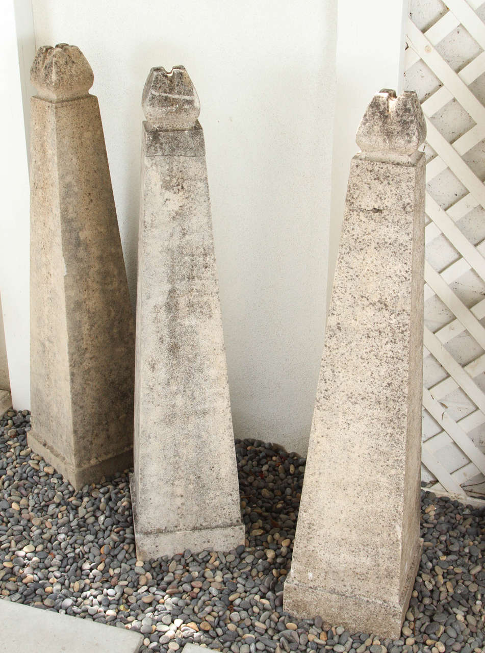 Five stone obelisks with great patina. Unknown country of origin or creator. Believed to be early 20th century or earlier.