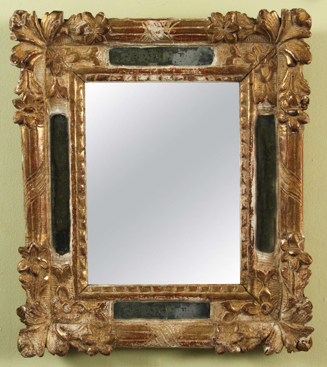 A small 18th century carved and gilt French Rococo period mirror, circa 1750.