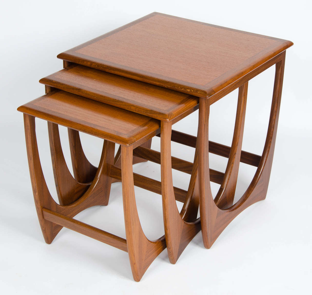 A very nest of tables from the British manufacturer E.Gomme. Designed by V. Wilkins as part of the G-Plan range, seeing production in the early 1970's. Classic G-Plan construction in solid teak.