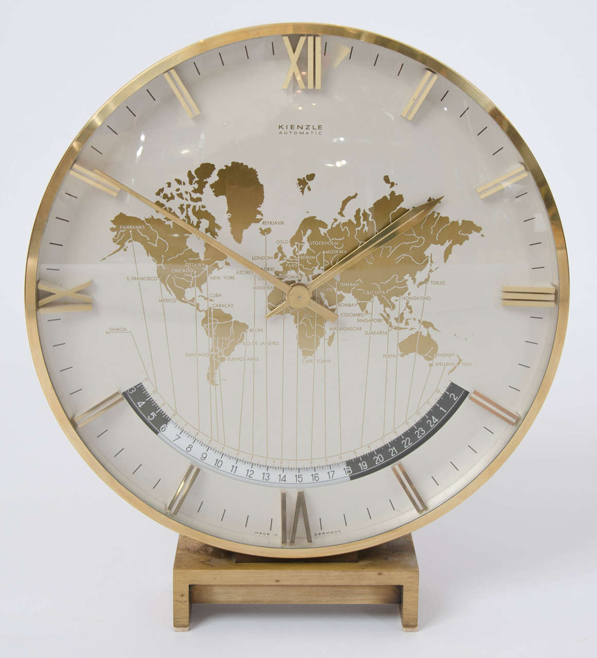 Large brass electric clock by Kienzle, innovative makers of table clocks and other time pieces founded 1883.