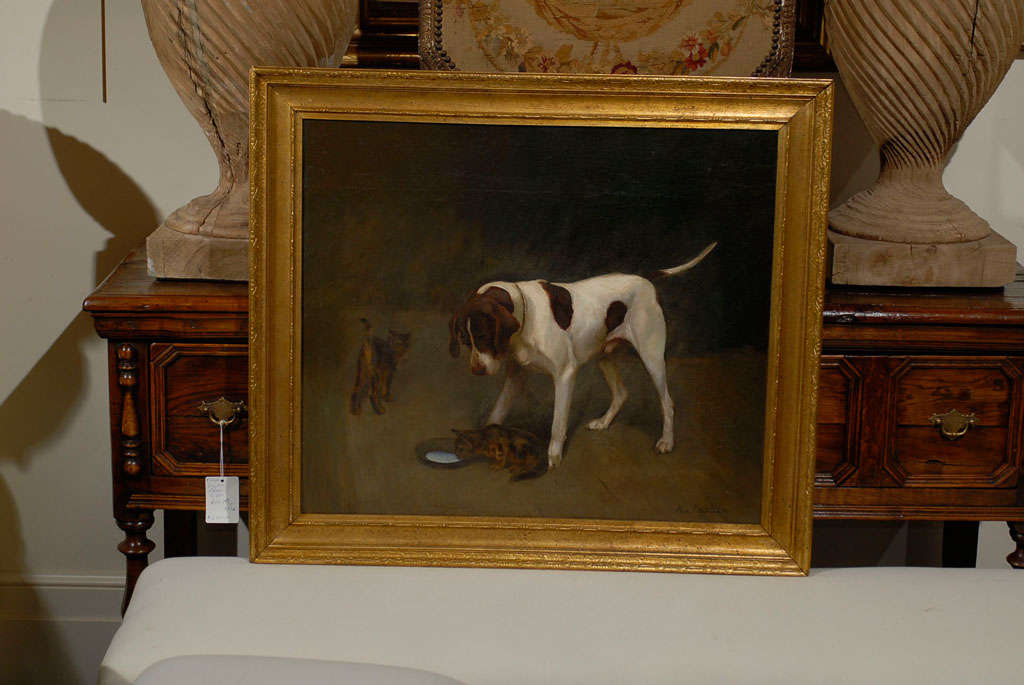 Large oil painting of dog and two cats, charming.In a gilt frame.