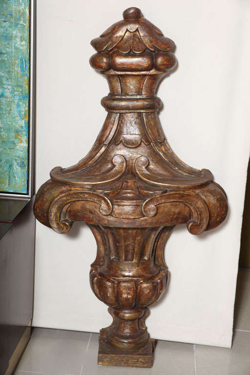 Monumental Italian neoclassic giltwood wall urn of typical form with original gilt finish.