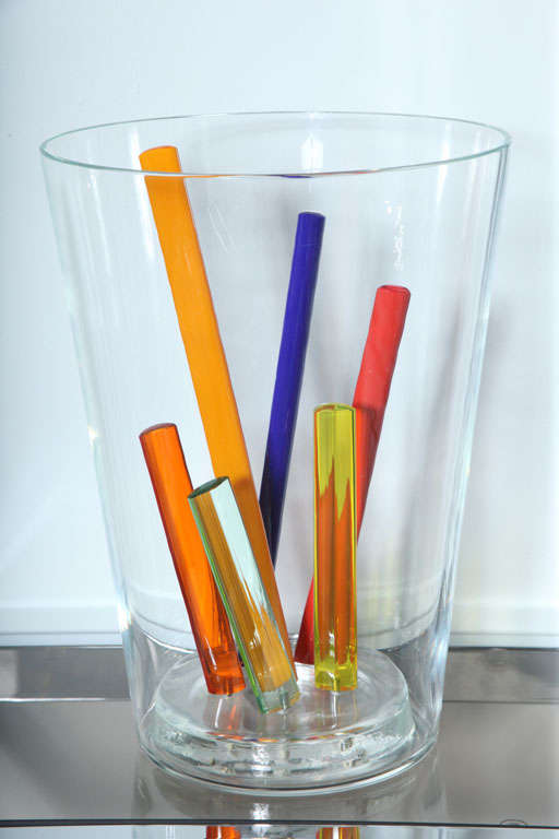 The glass rods that are removable within a glass vase stamp to bottom.