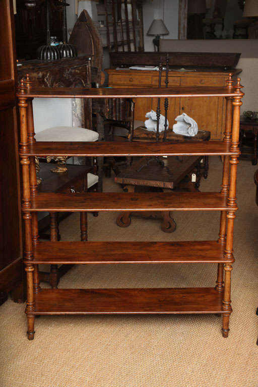 Five shelf stand with turned legs and finials