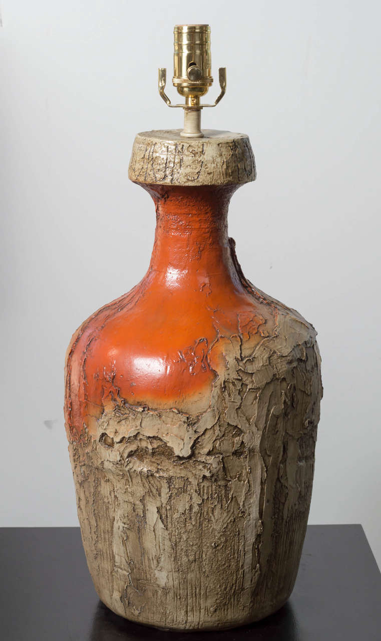 Pair of Orange Mud Cast Ceramic Lamps