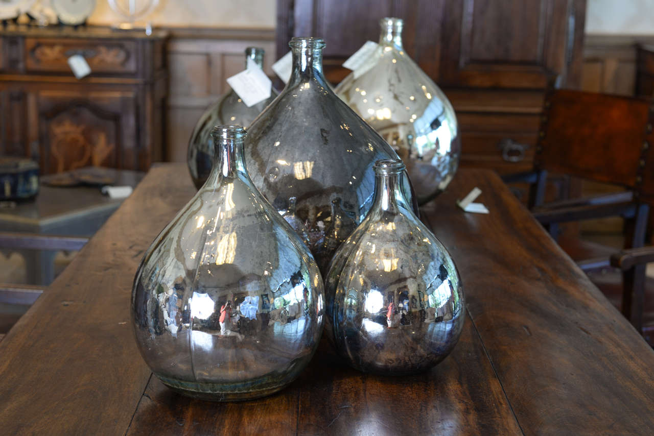 19th Century Collection of Mercury Glass Calvados Bottles